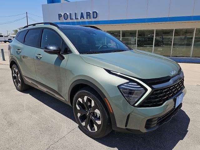2024 Kia Sportage X-Line in Green — front three-quarter view